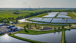 Landscape with a solar farm and a wind farm